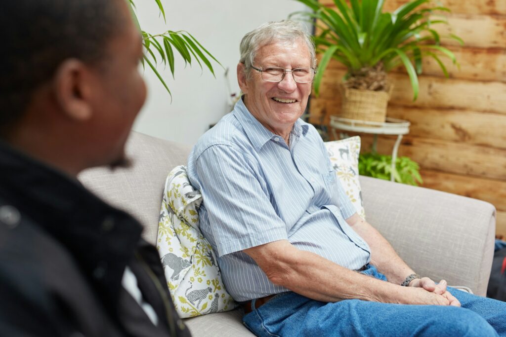 An old man smiles during PTSD treatment near Orlando
