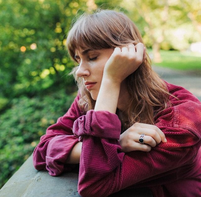 A woman looks sad as she considers a cognitive test in Florida